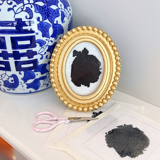 Custom silhouette hand-painted needlepoint canvas created from a personalized profile