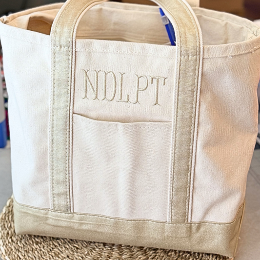 Medium needlepoint project bag with embroidered NDLPT personalization