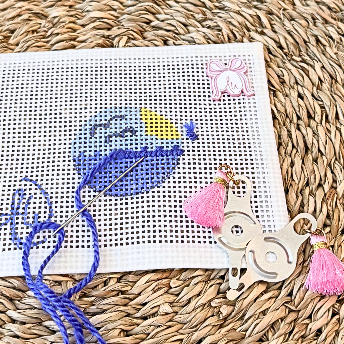 Fun needle threader accessory for stitchers with tassel accent for easy project bag access