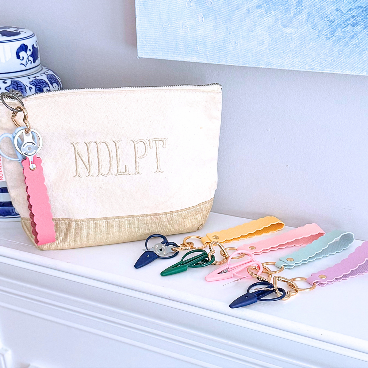 The perfect project bag accessory, The Stitching Sidekick Needlepoint Snips & Threader Set has both your needlepoint project bag scissors and a needle threader on a project bag clip!