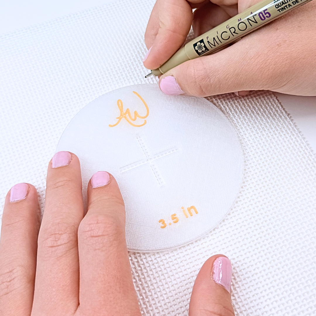 A photo showing how to use the circle stencil set for needlepoint.