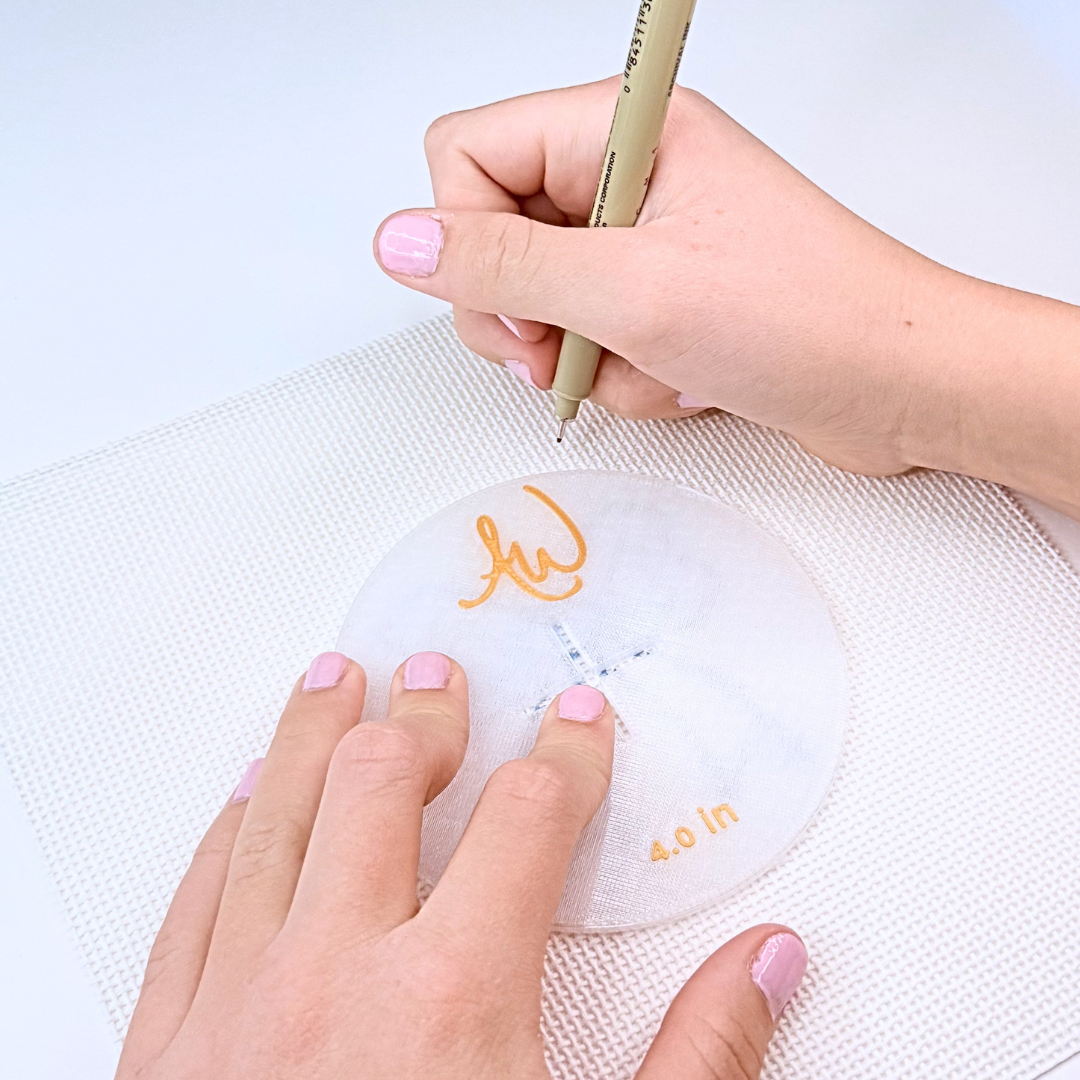 A photo showing how to use the circle stencil set for needlepoint.
