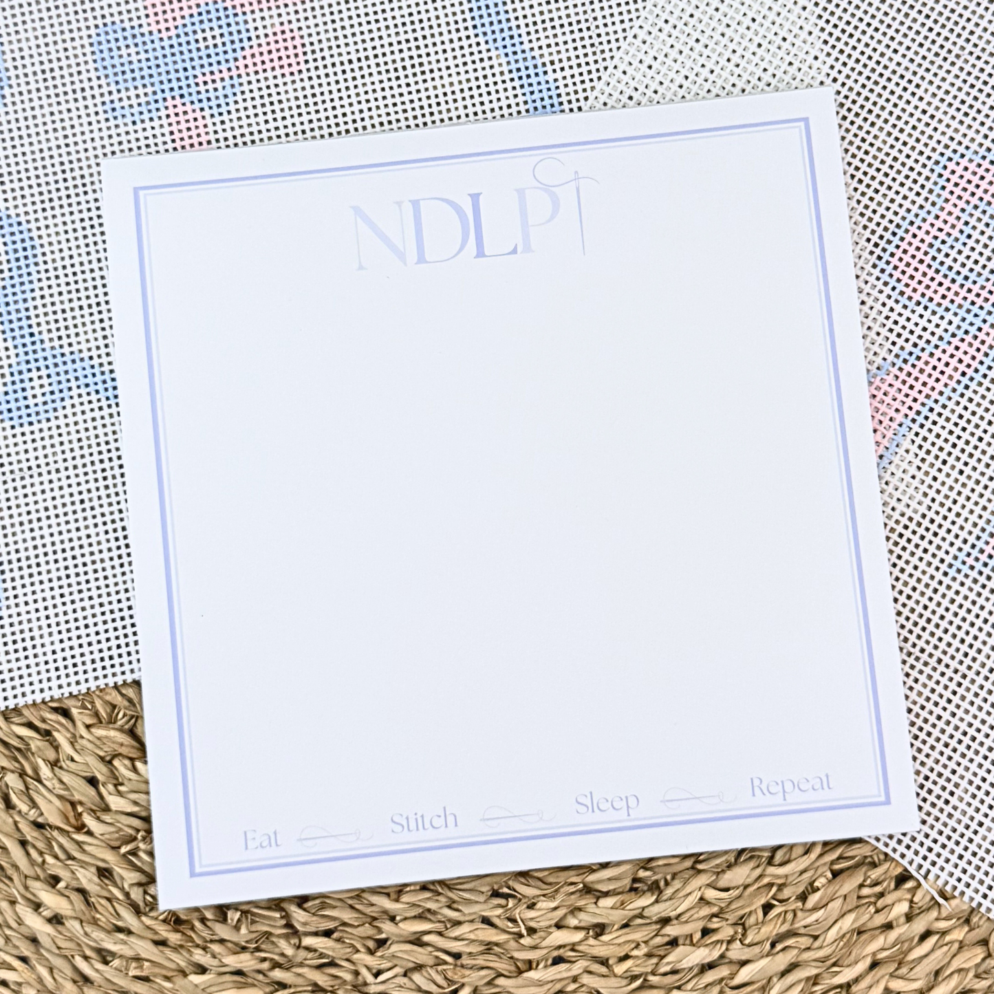 Giftable notepad for stitchers with soft lavender border and NDLPT monogram