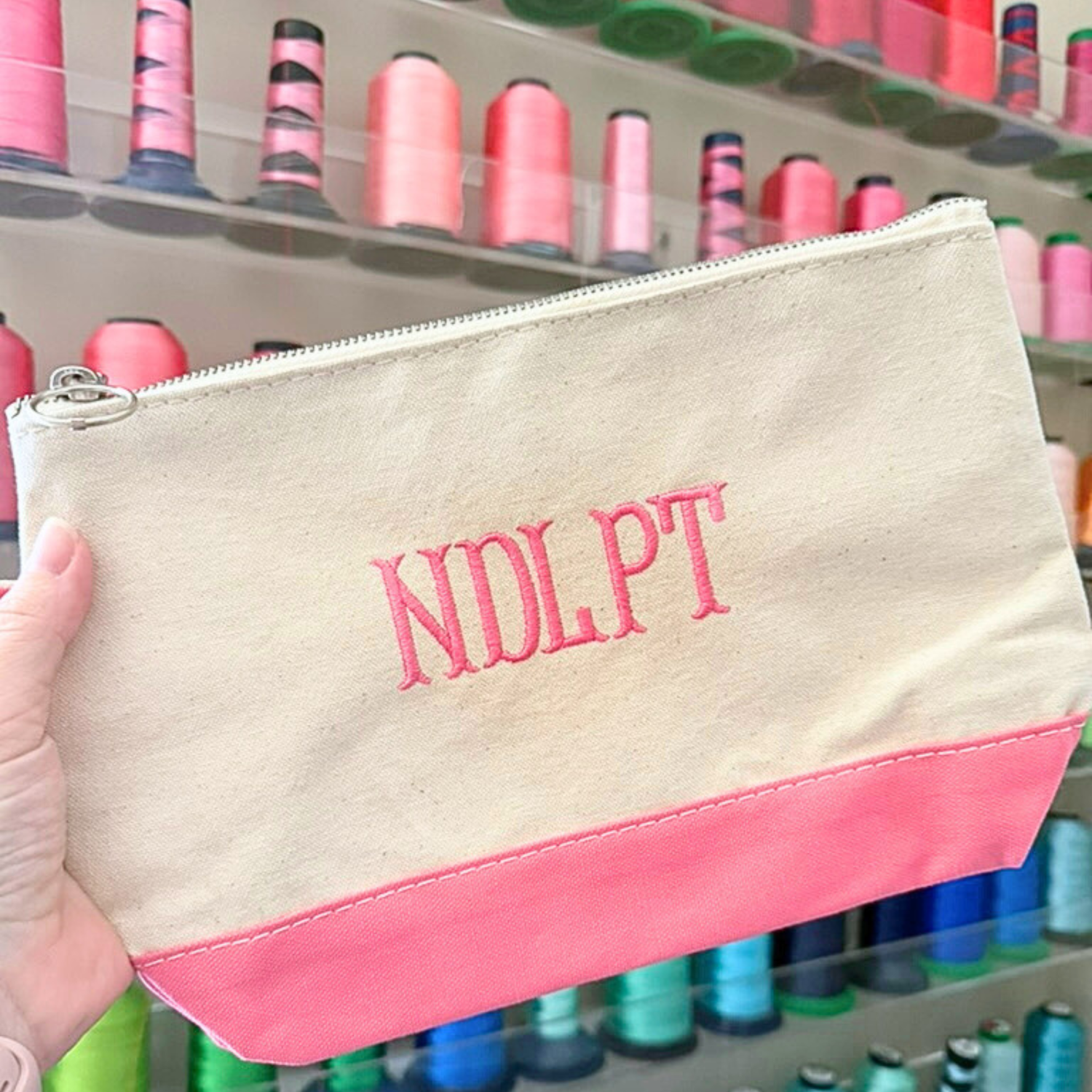 Small personalized needlepoint project pouch with fishtail NDLPT monogram