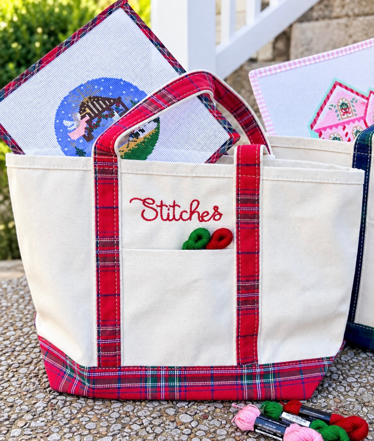 Red plaid needlepoint project tote with zippered top and exterior pocket