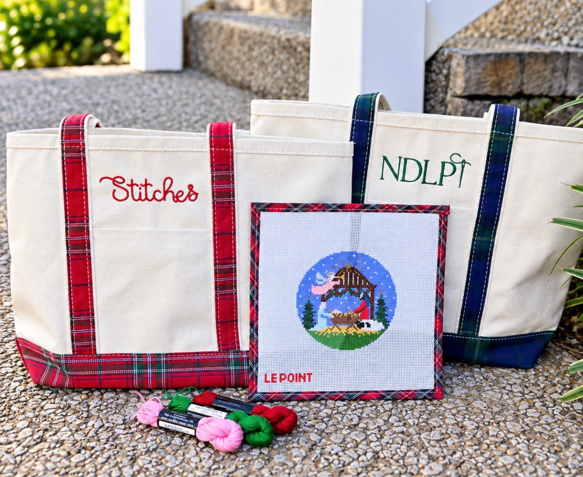 Holiday plaid needlepoint tote with canvas, thread organizers and stitching supplies